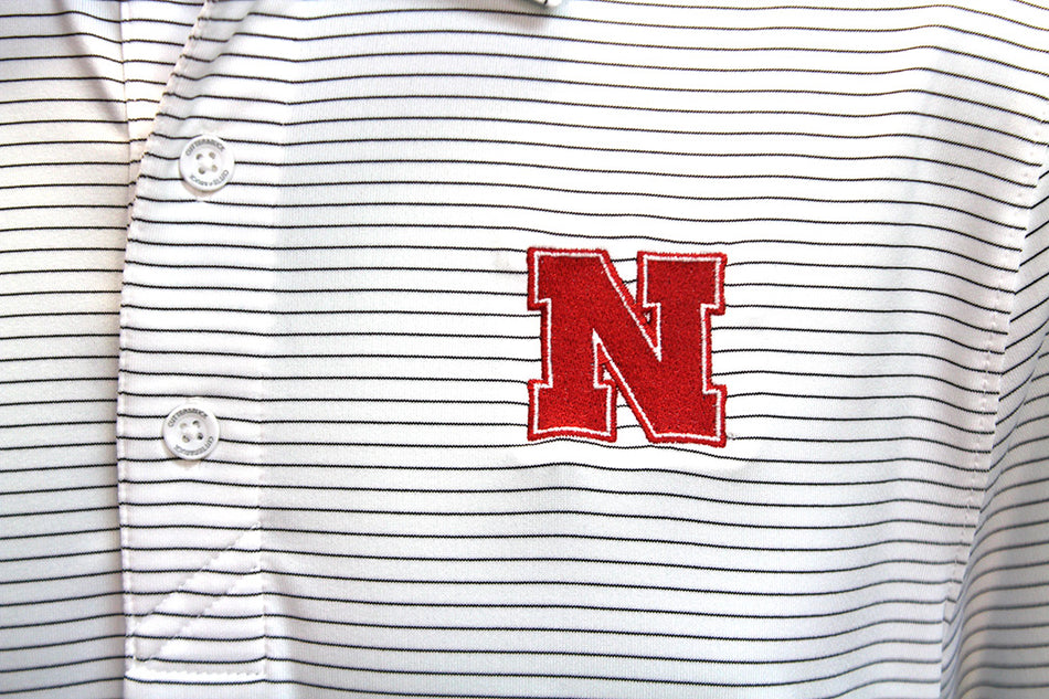 Nebraska Forge Stripe Cutter N Buck Golf Shirt