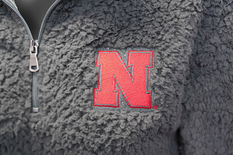 Nebraska Gals Varsity Quarter Zip Sherpa