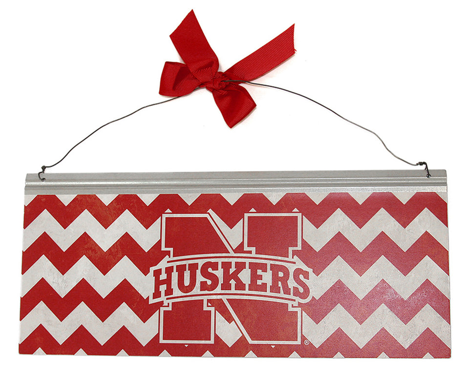 N Huskers Chevron Bow Tin Sign